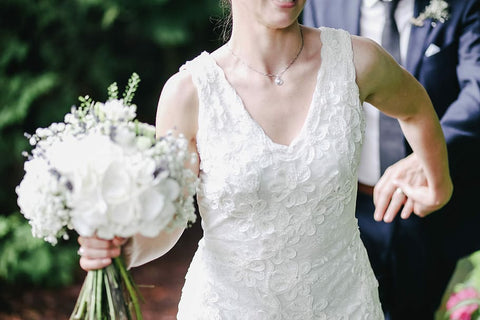 bride with V neckline wedding dress