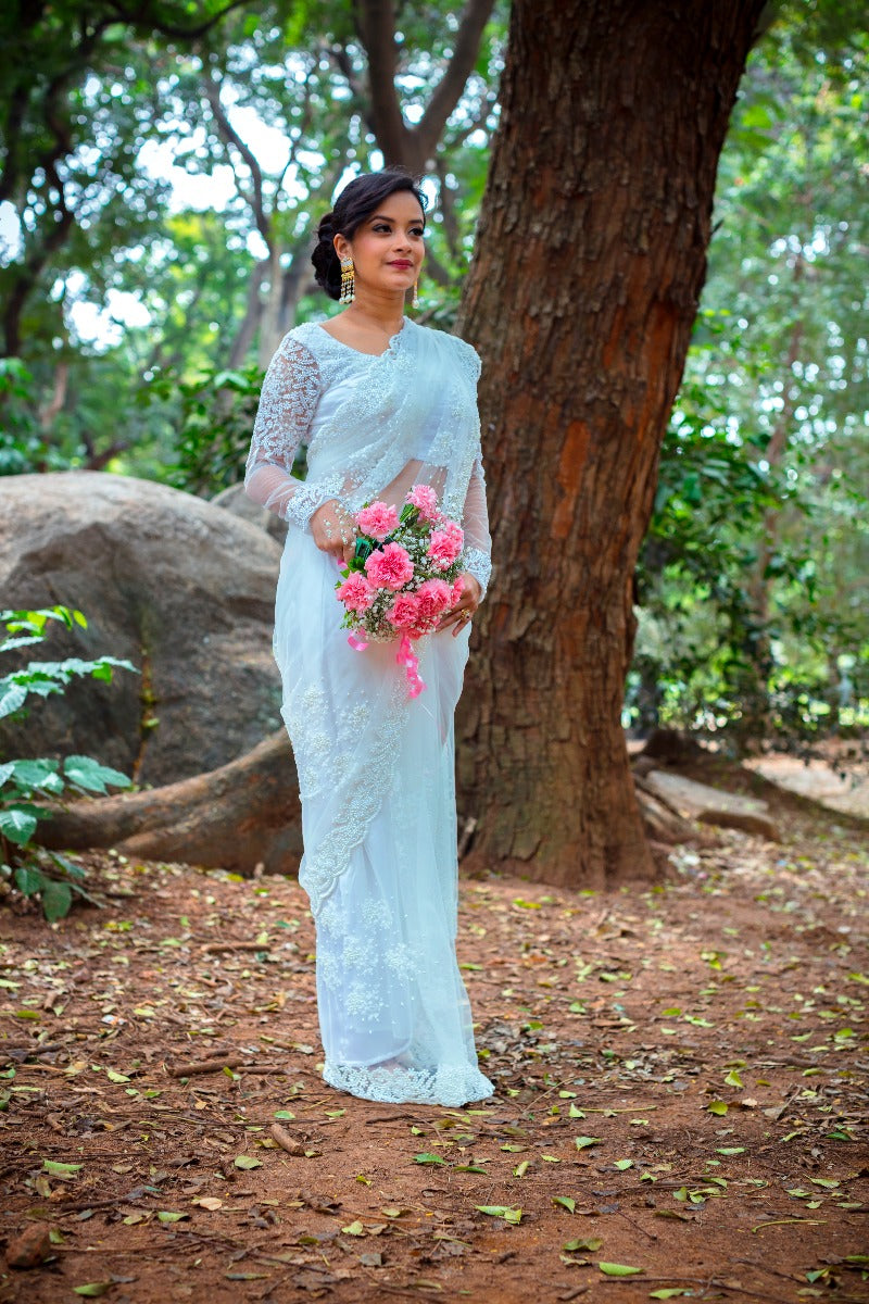 Buy Pastel Orange Sequins Embroidered Net Saree Online  Samyakk