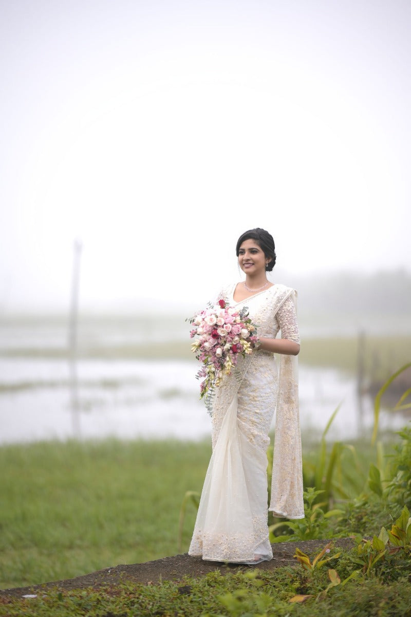 Bride Jinju looks enthralling in this white bridal saree from Jayalakshmi  Silks! The bridesmaids are also wearing sarees from Jayalakshmi... |  Instagram