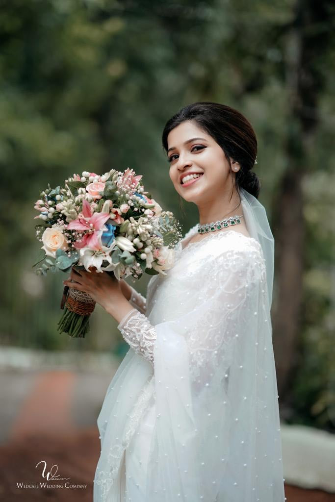 Sara in ethereal bridal saree | Bridal saree, Christian wedding sarees, Christian  bridal saree