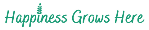 The Hickey's Greenhouses slogan that reads as "Happiness Grows Here".