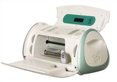 Cricut cutter machine and 4 cartridges