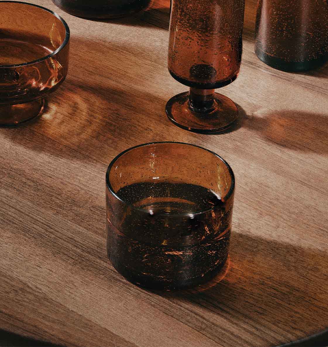 Ferm Living Oli Glassware, in Amber.