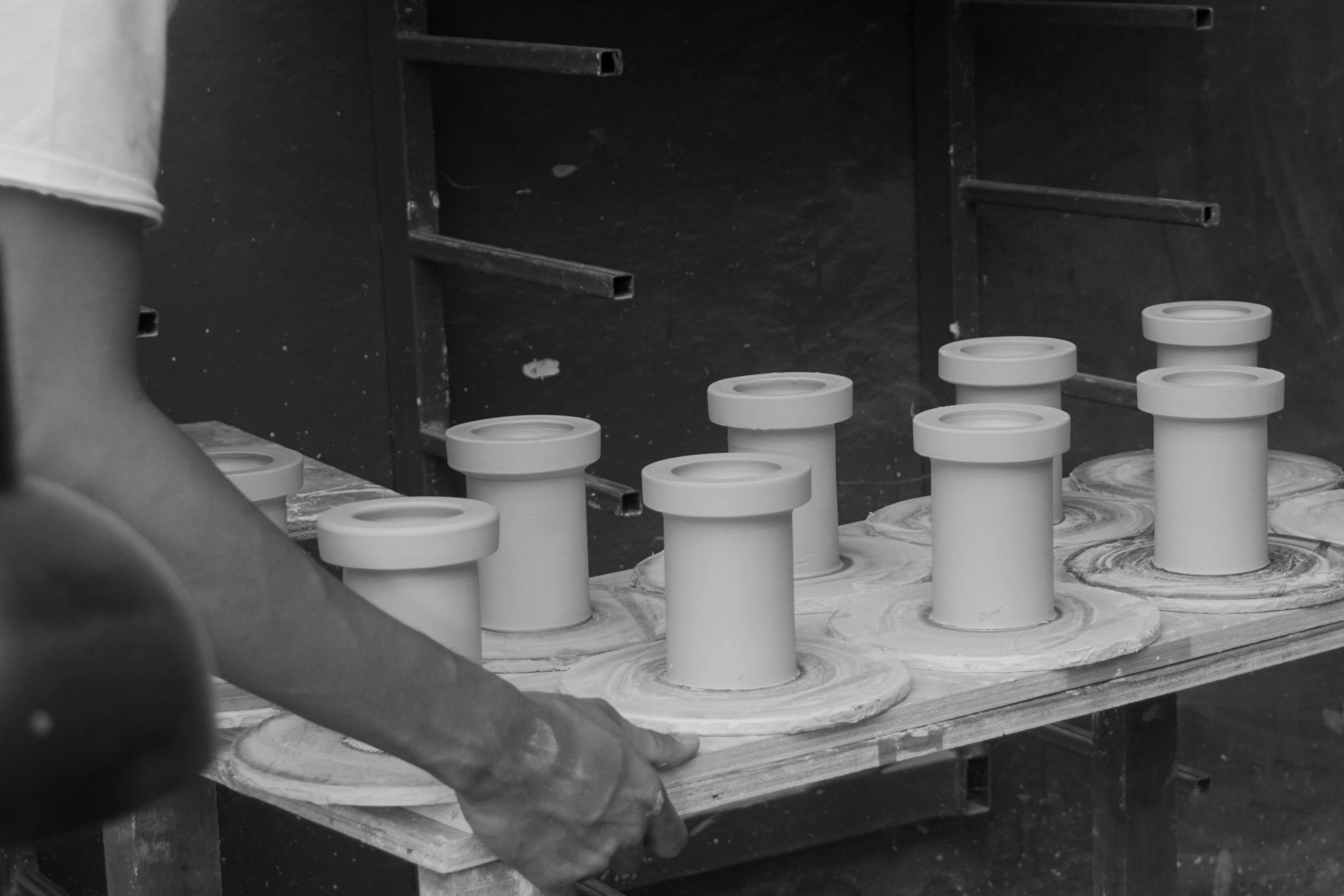 Our handmade clay ceramic shades in various stages of production. Photo supplied by Gaya ceramics.