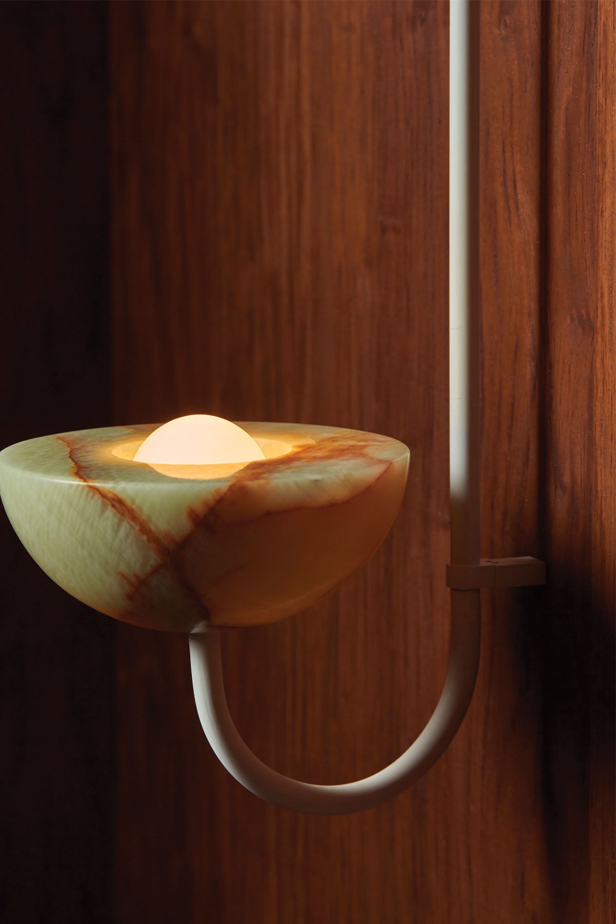 Aurelia Wall Light in Jade Onyx and White Satin. Image by Lawrence Furzey