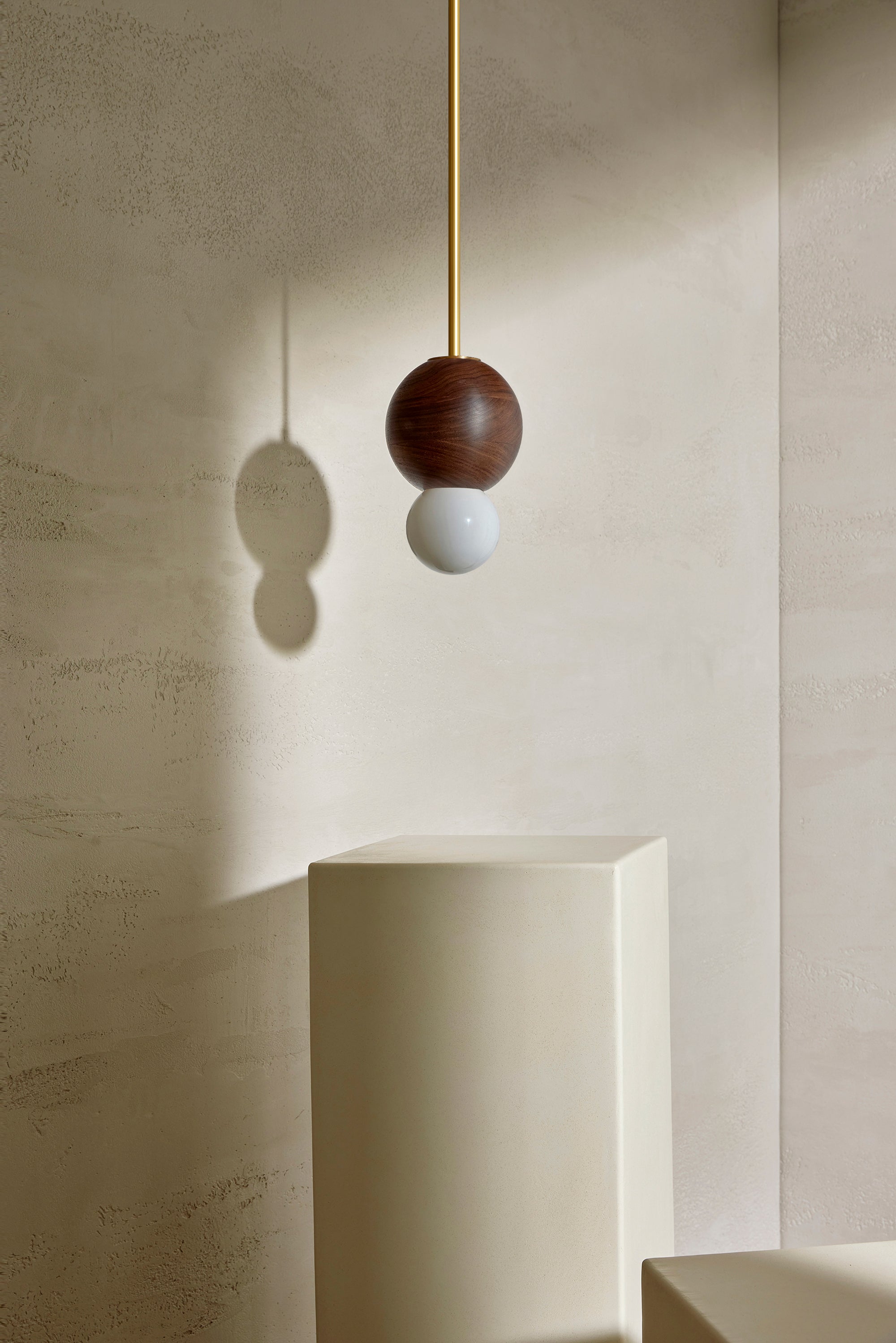 Bright Beads Sphere Pendant in Walnut, Brass & Opal. Photographed by Lawrence Furzey.