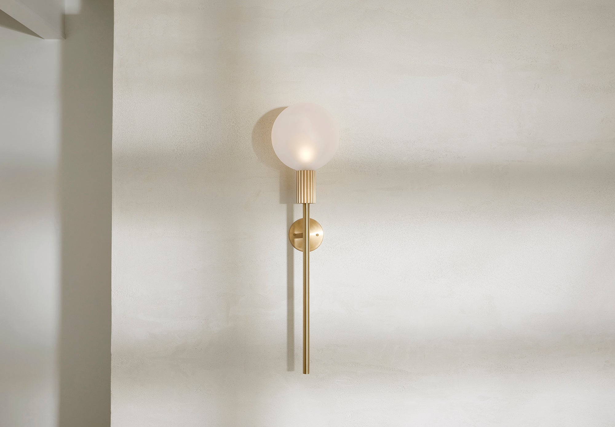 Marz Designs Feature Lighting - Attalos Wall Light 200 hanging on a wall.