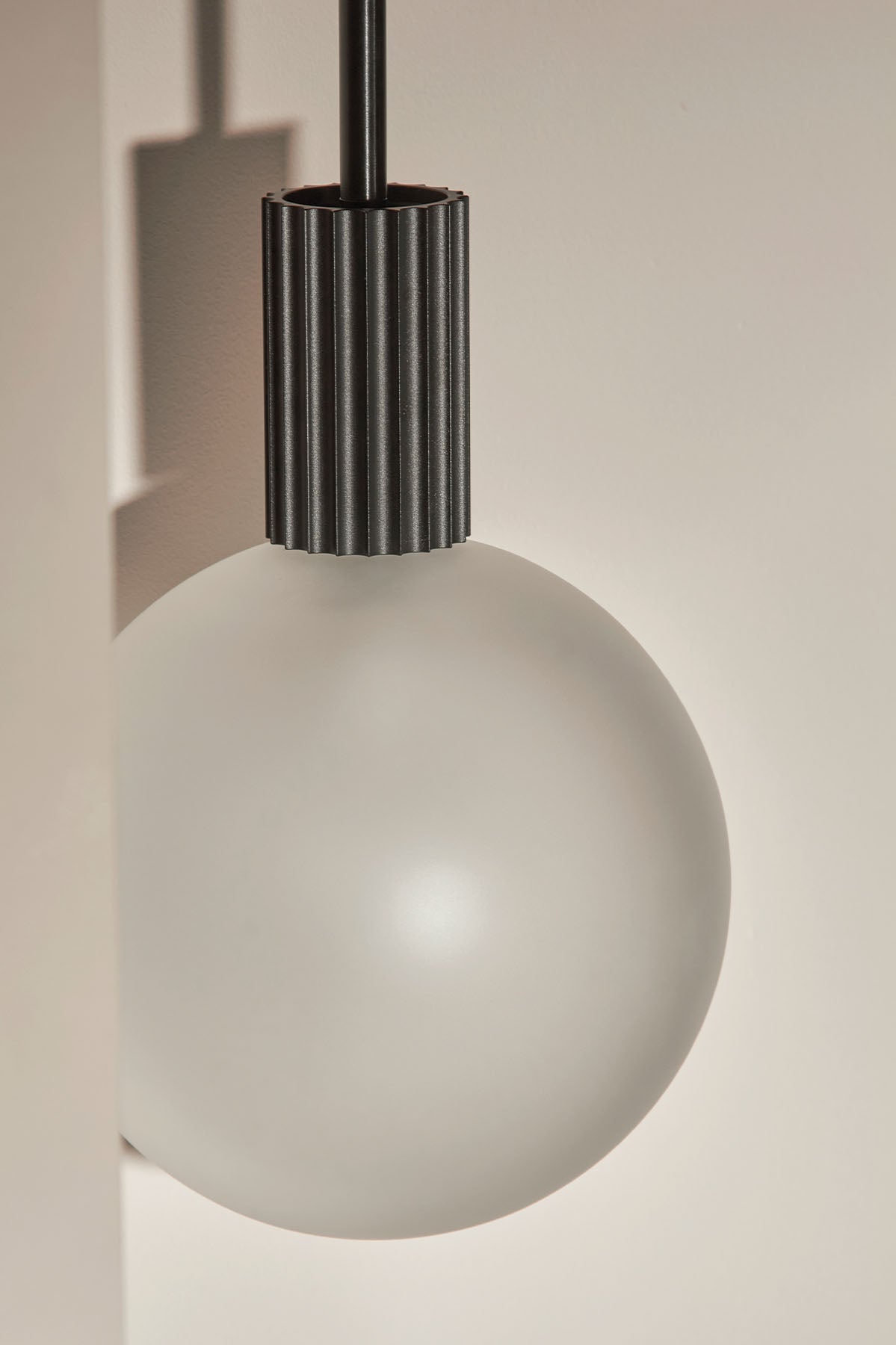 Attalos Pendant Light, 200 in Brushed Black. Image by Lawrence Furzey