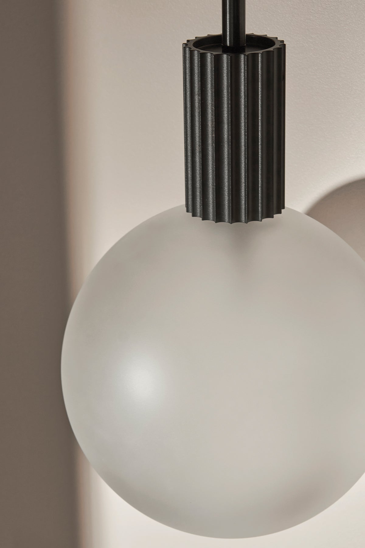 Attalos Pendant Light, 200 in Brushed Black. Image by Lawrence Furzey