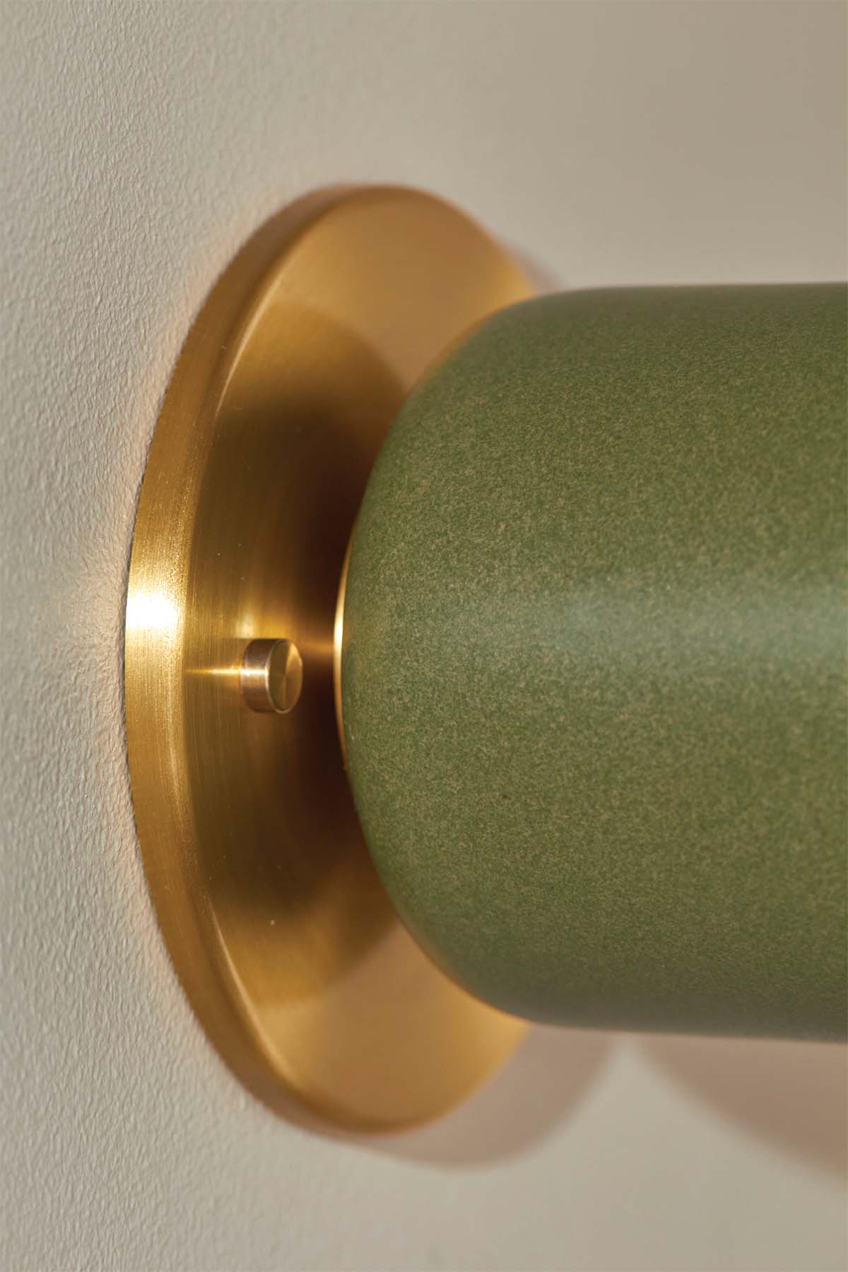 Terra 1 Surface Sconce, Slim Base Adapter in Olive and Brass. Image by Lawrence Furzey.