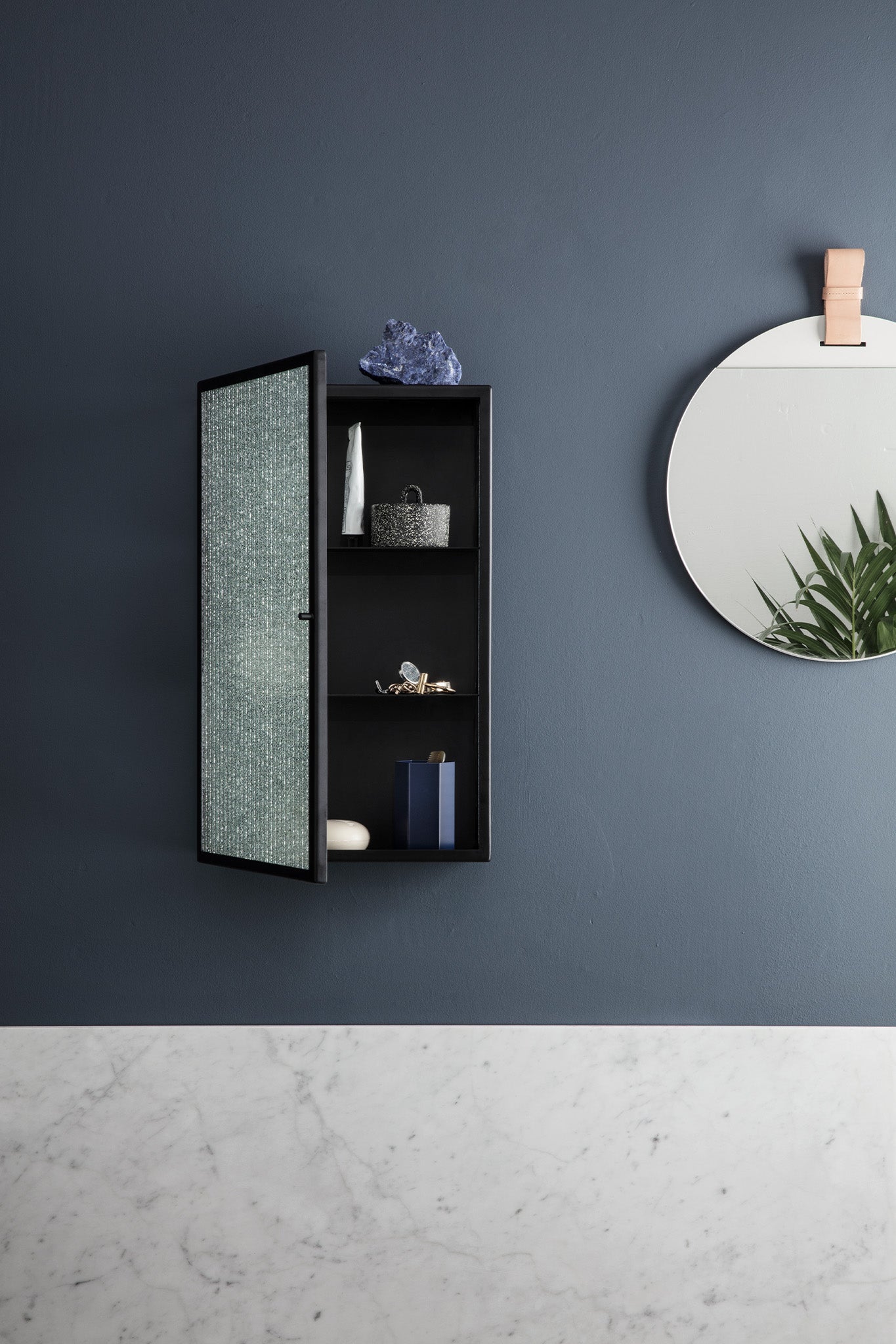 Haze Wall Cabinet, Wired Glass in Black. Image by Ferm Living