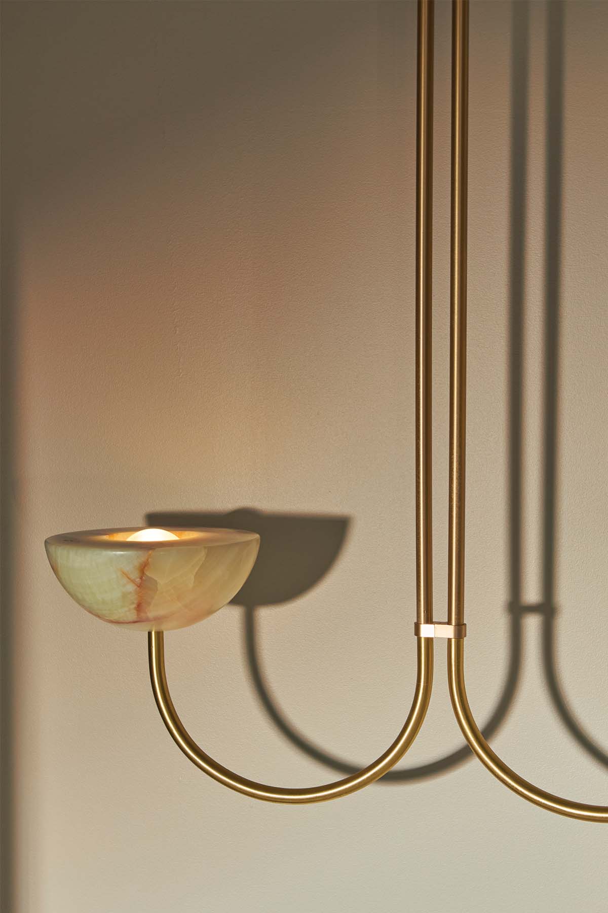 Aurelia Double Pendant, Jade Onyx and Brass. Image by Lawrence Furzey