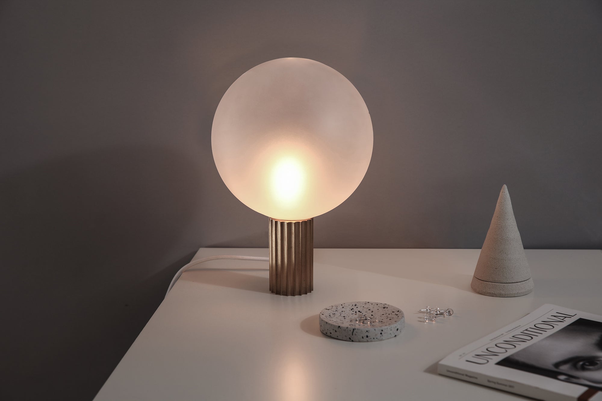 Marz Designs Attalos Table Lamp 200 on a table.