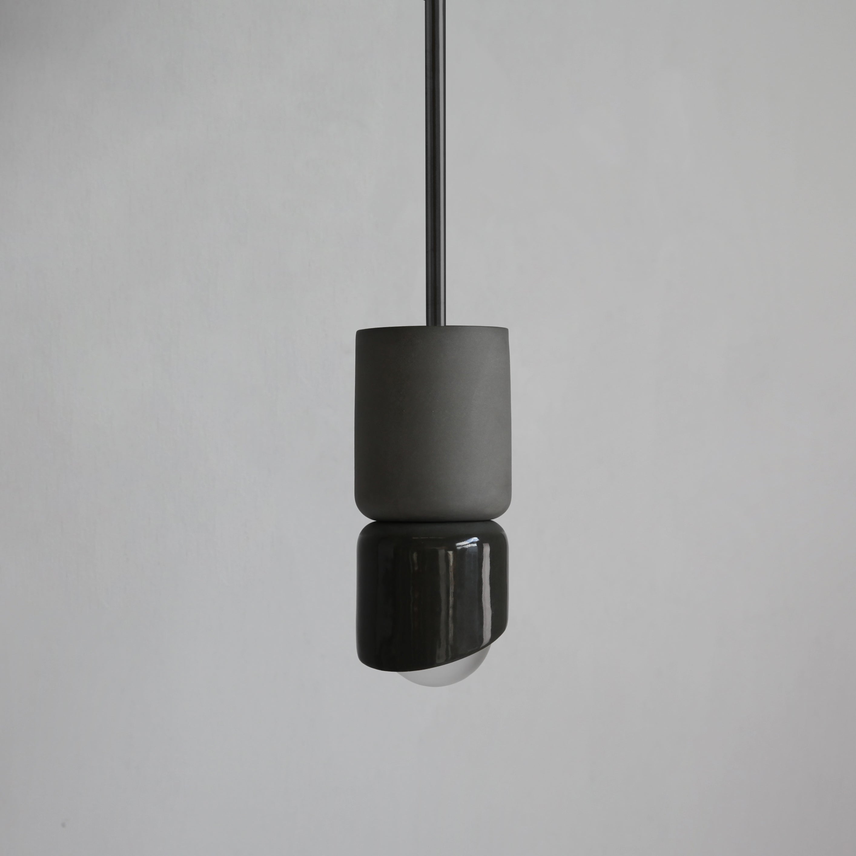 Terra 1.5 Pendant in Slate with Brushed Black fittings. Photographed by Leeroy Morgan.