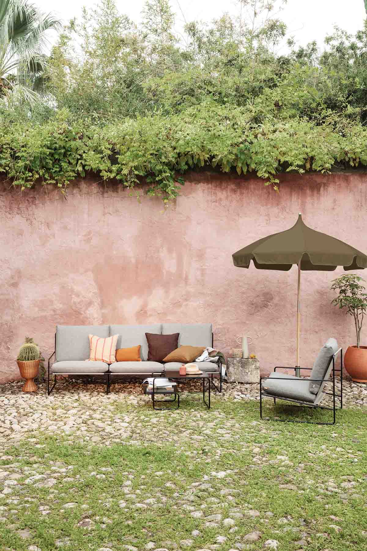 Ferm Living Lull Umbrella, in Military Olive in-situ with Desert Lounge Chairs