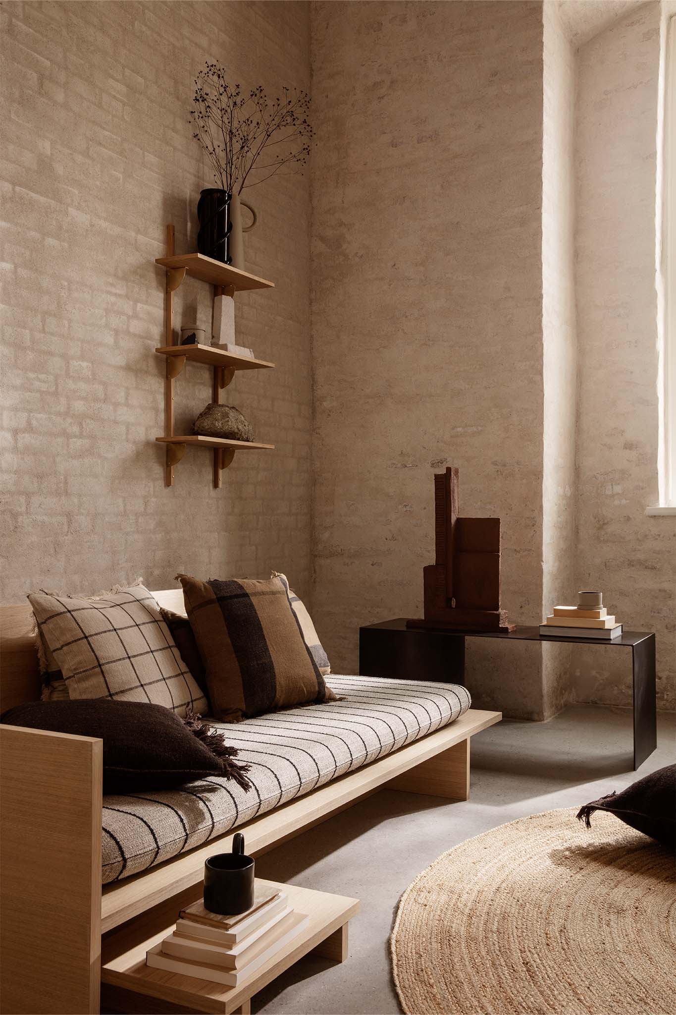Sector Triple Shelf Narrow in natural oak and brass in-situ. Image provided by Ferm Living. 