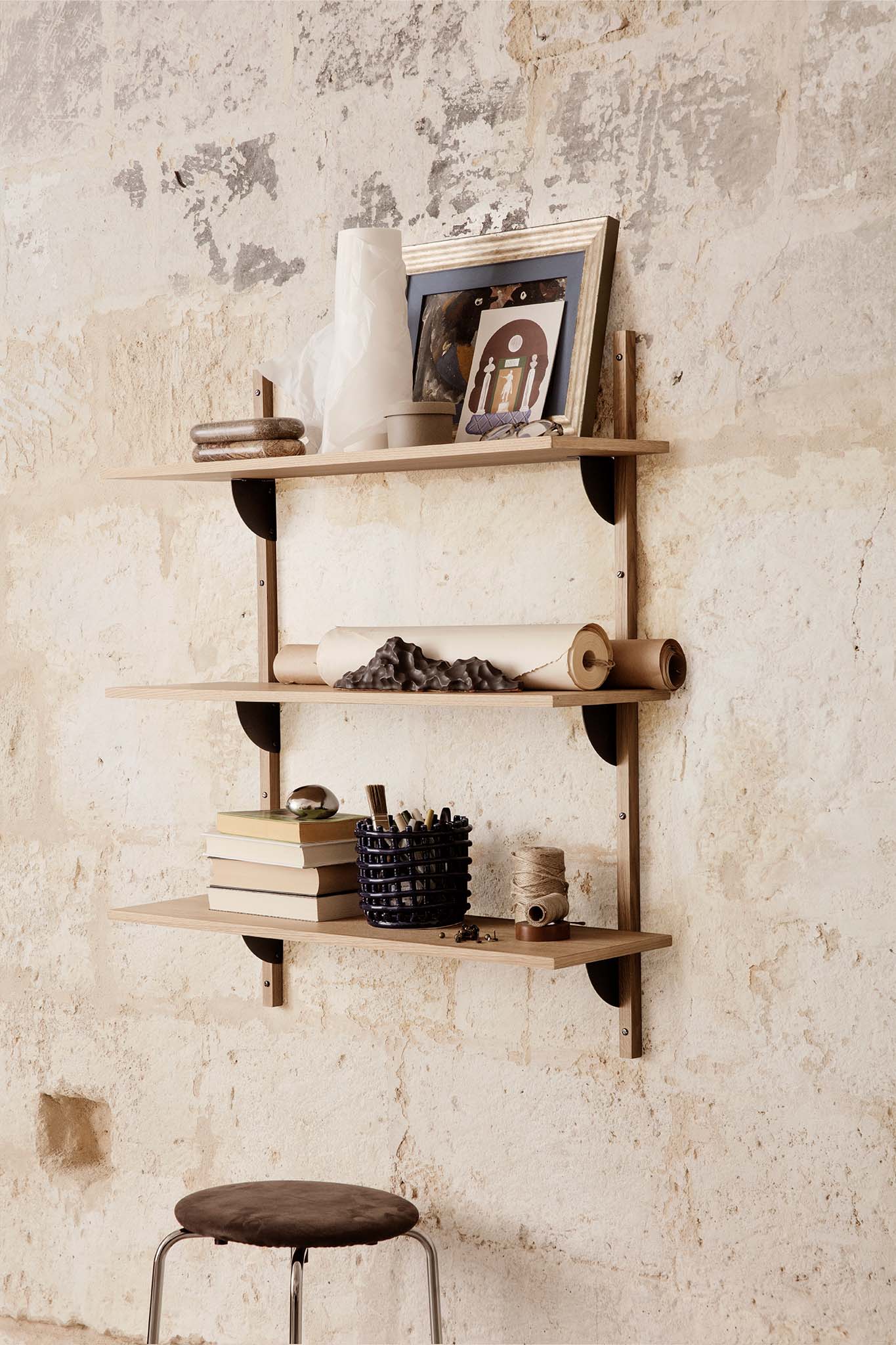 Sector Triple Shelf Narrow in natural oak and black brass in-situ. Image provided by Ferm Living. 