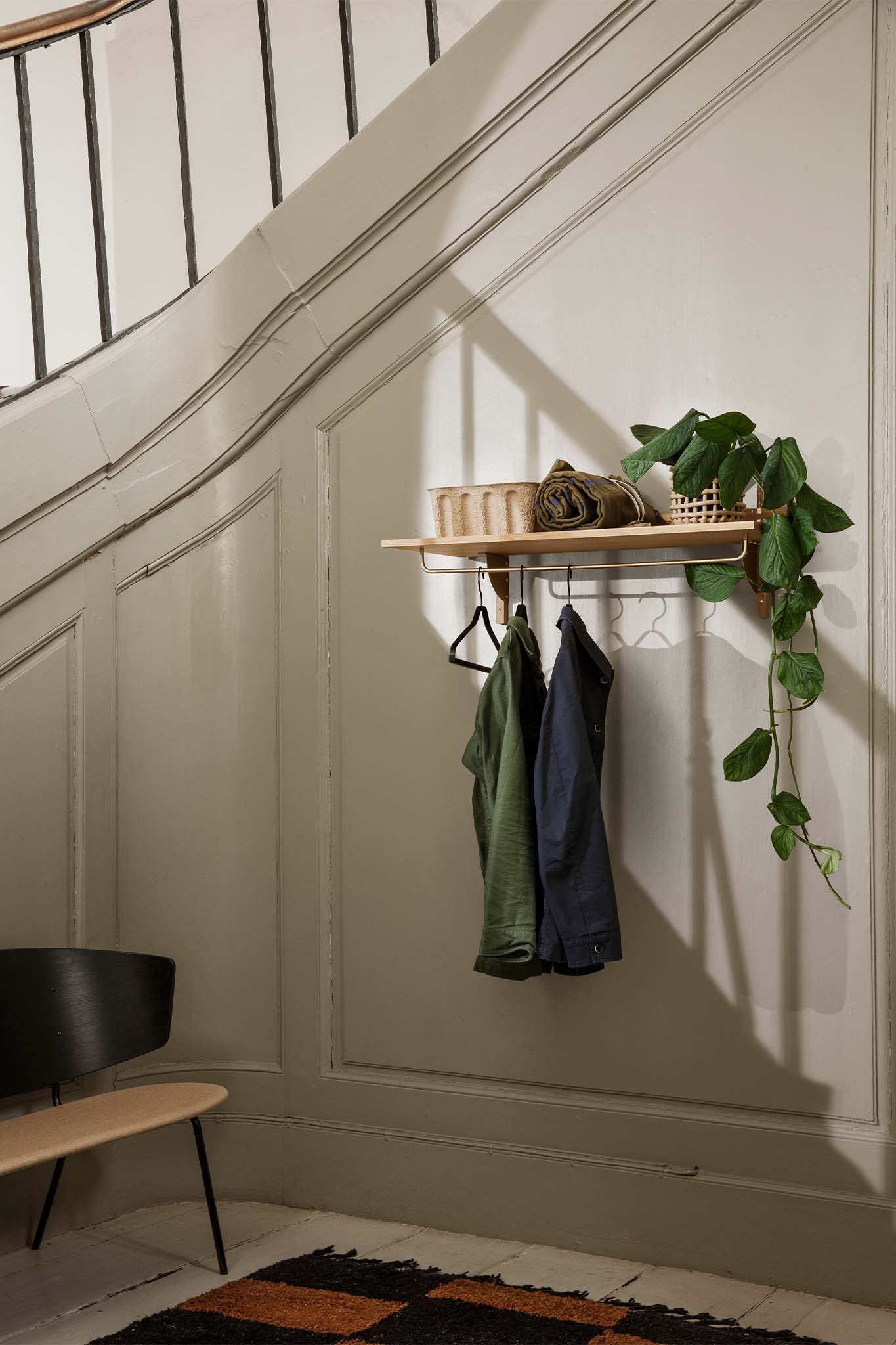 Sector Rack Shelf in natural oak and brass in-situ. Image provided by Ferm Living. 