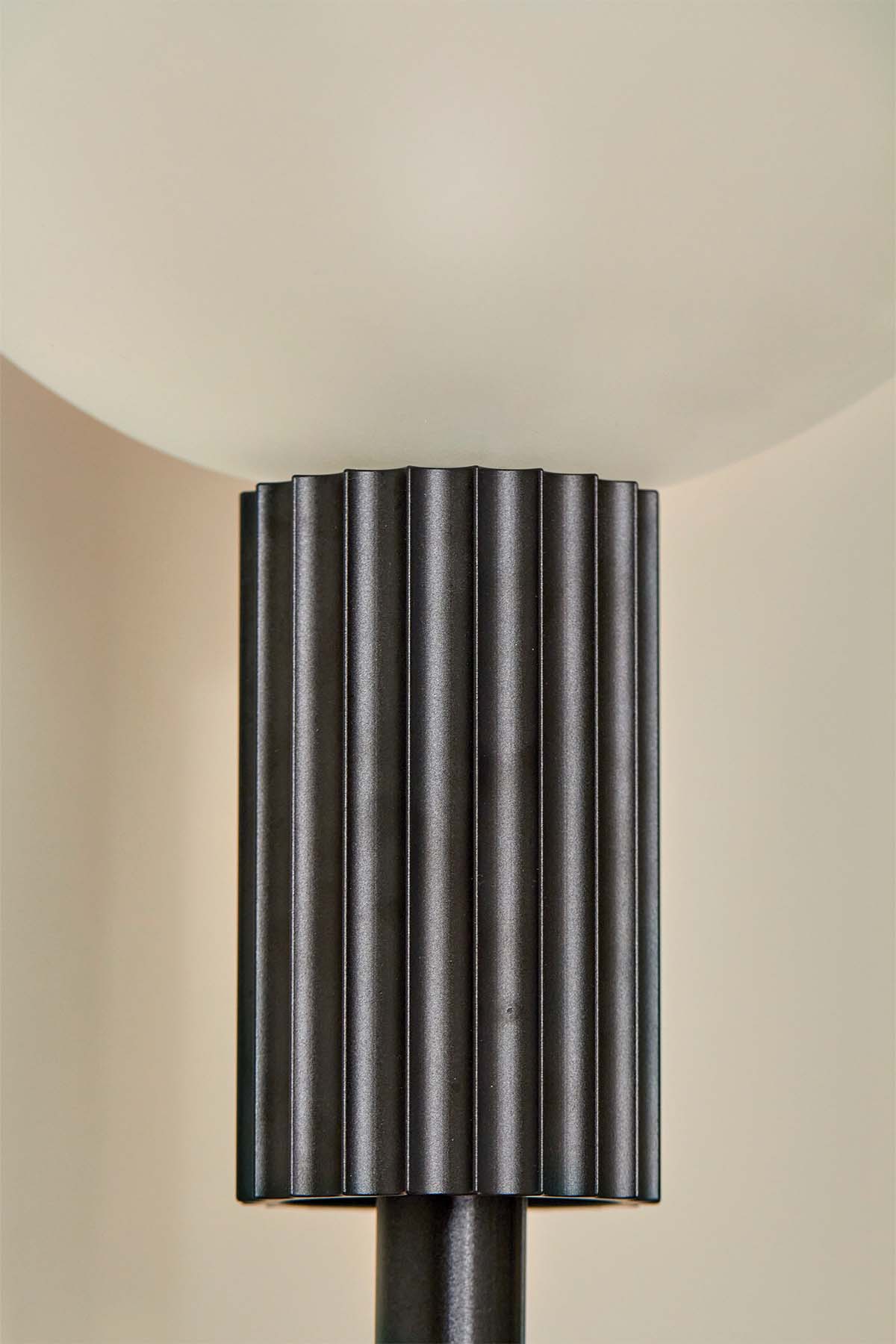Attalos Wall Light, 200 in Brushed Black. Image by Lawrence Furzey. 