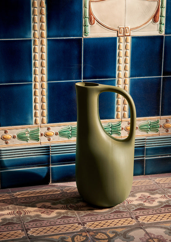 Liba Watering Can in Olive. Image by Ferm Living