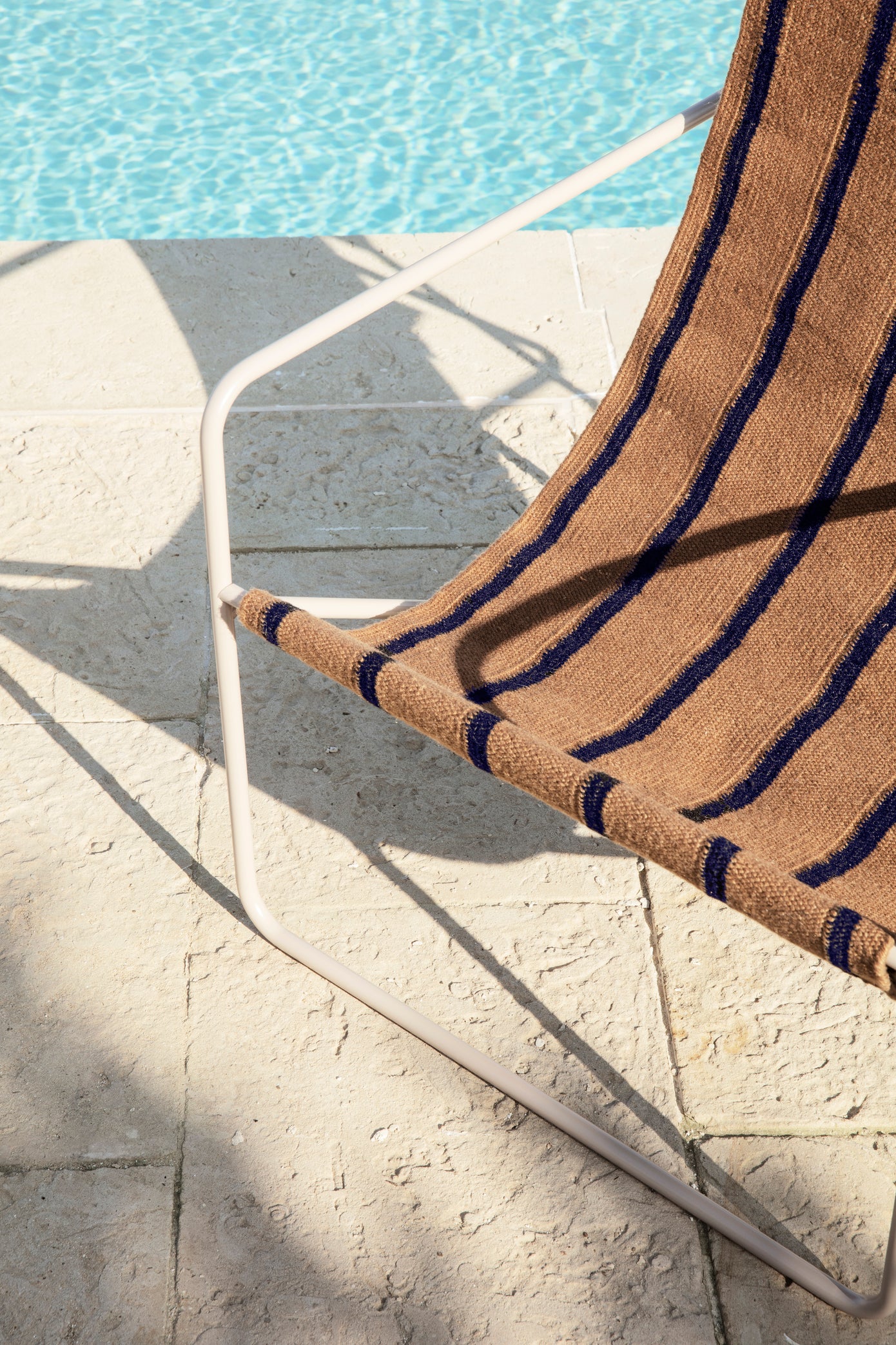 Desert Lounge Chair, detail of Black Stripe. Image by Ferm Living