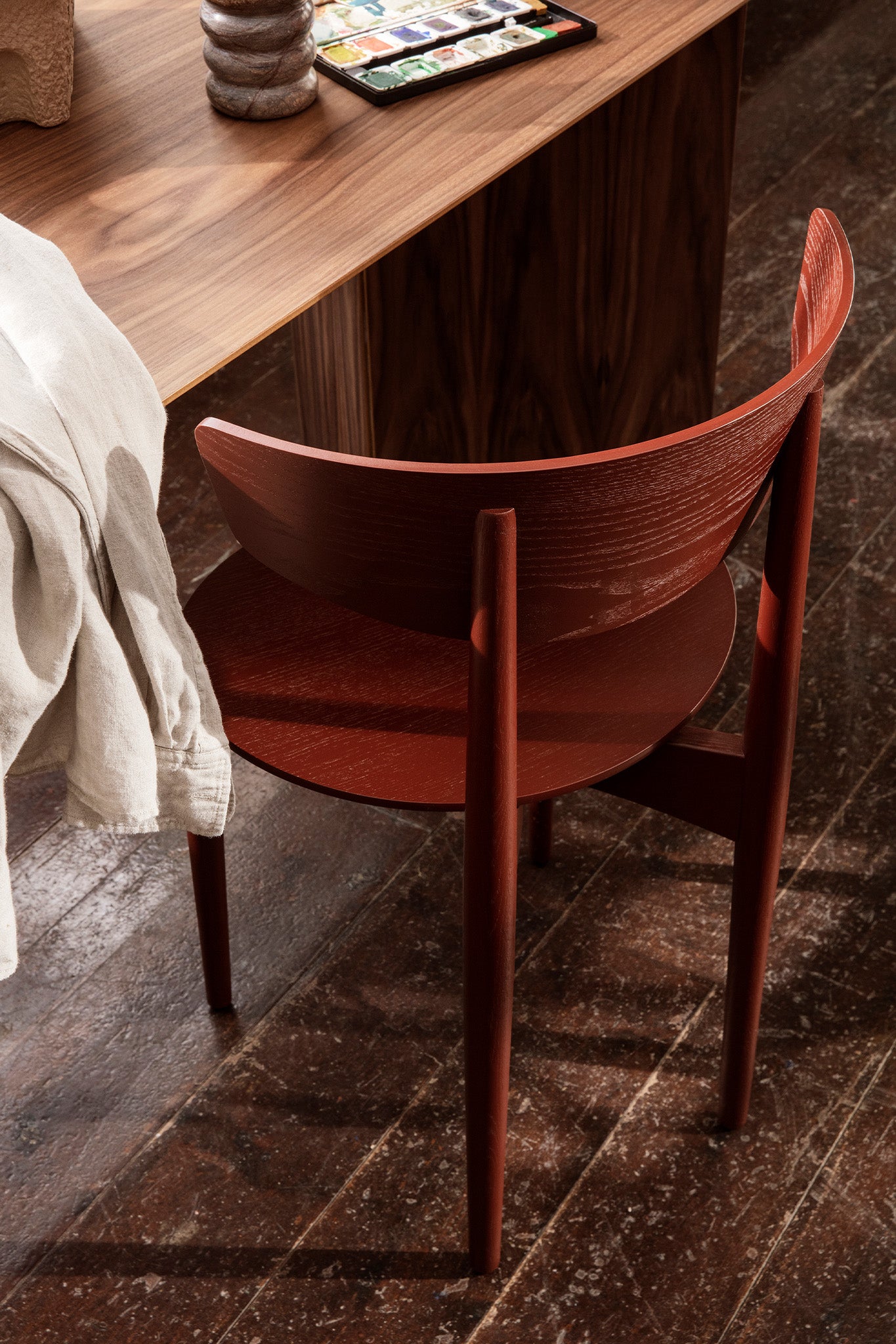Herman Dining Chair Wood in Red Brown. Image by Ferm Living
