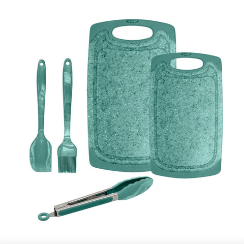 blue utensils and cutting board
