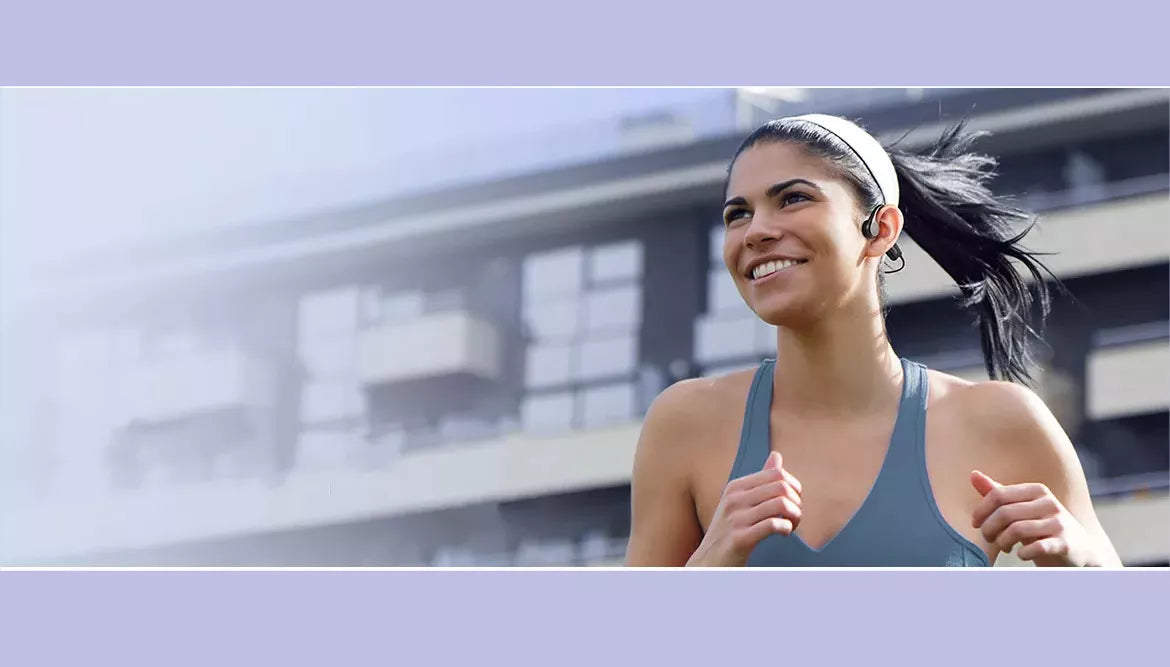 A person is running with bone conduction headphones on