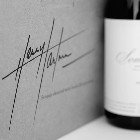 Harry Hartman logo and somesay shiraz bottle