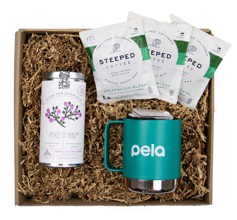 Image of a sustainable gift box that includes coffee bags from Steeped Coffee, tea from Flying Birds Botanicals, and a to-go mug from Klean Kanteen