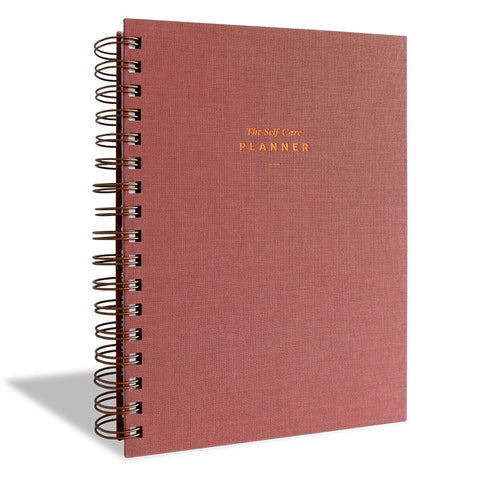 Image of a dusty rose Self Care Planner