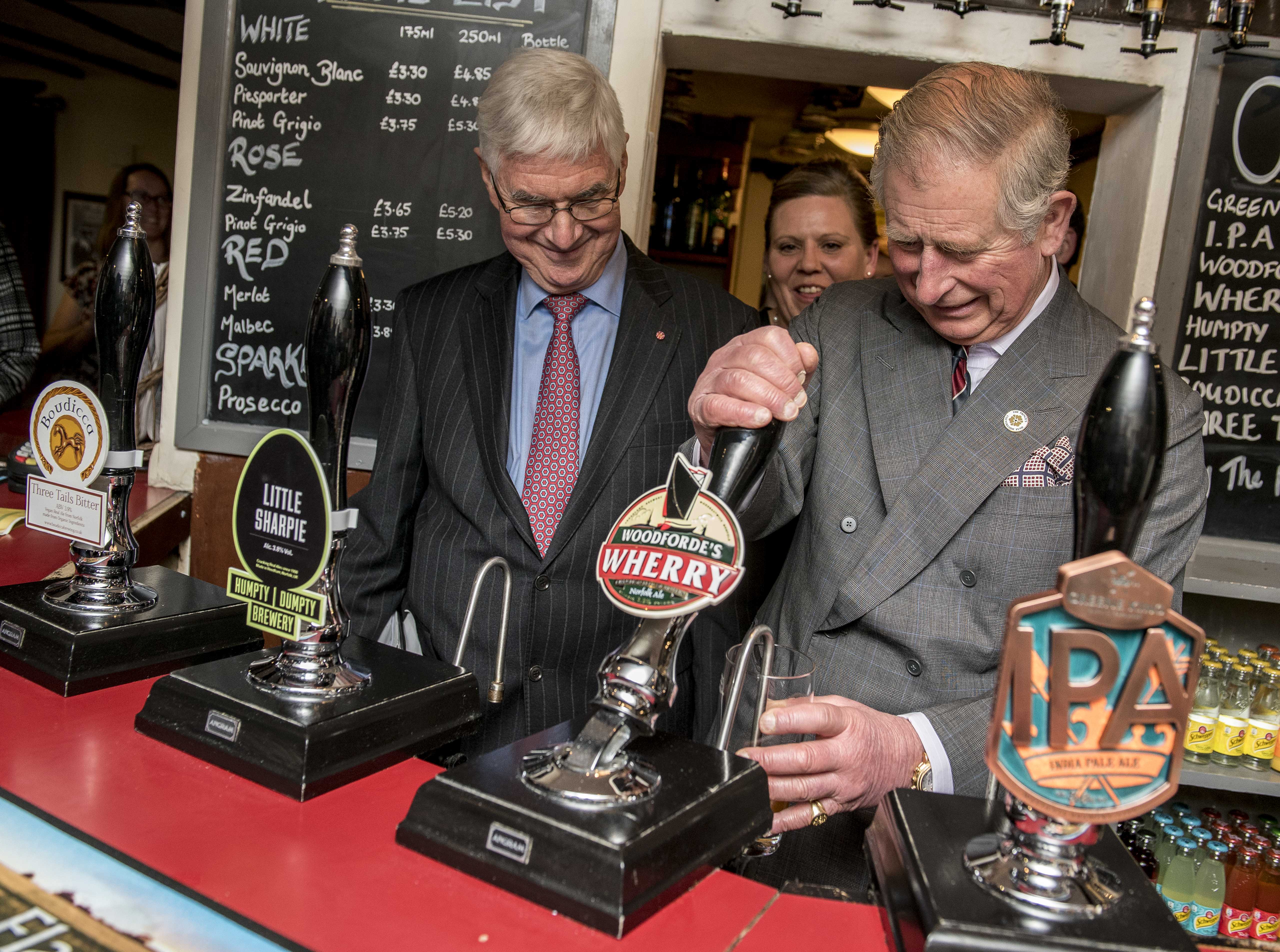 King Charles with a pint of Woodforde's Wherry