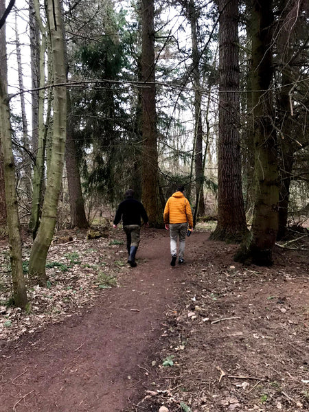 Rupert and Tom walking through woods