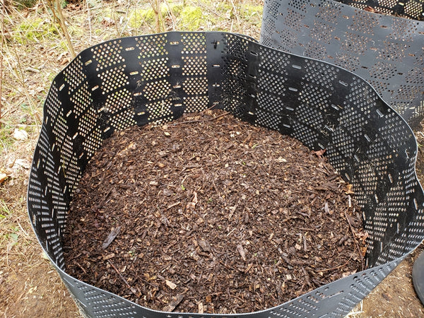 Woody mulch in a GeoBin composting system