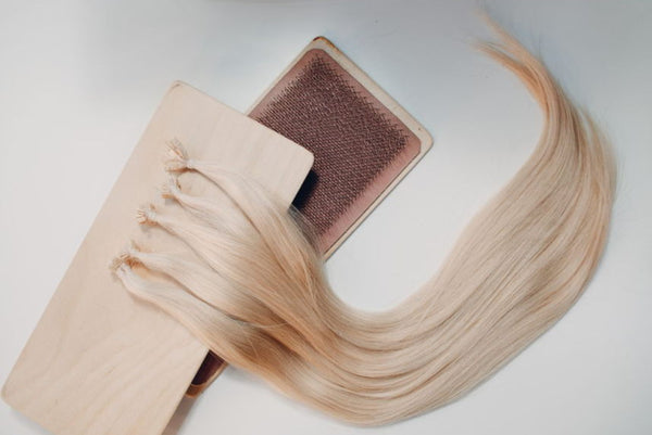 micro-beads hair extensions on table