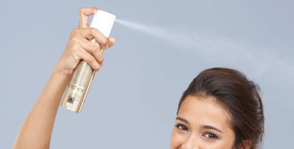 women spraying hair extensions in torremolinos