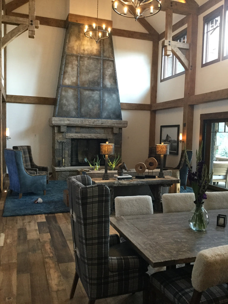 Reclaimed barn wood box beams and flooring make a room more inviting