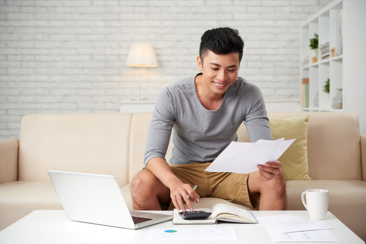 A man working from home in his living room