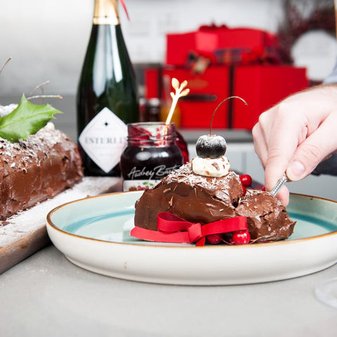 Enjoying your Chocolate Roulade with Cherries