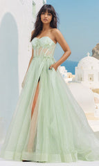 Image of a woman wearing a pastel prom dress in sage green.