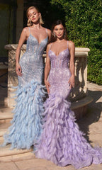 Image of two women wearing long pastel prom dresses. One is light blue and the other is light purple.