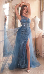 Image of woman wearing a blue one shoulder prom dress.