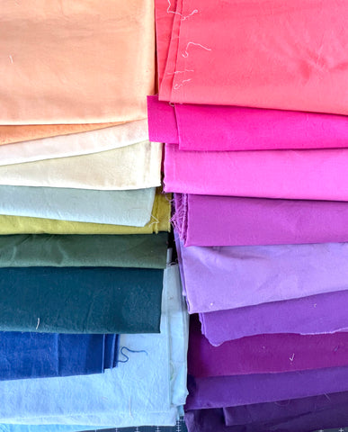 colorful stack of quilting cottons