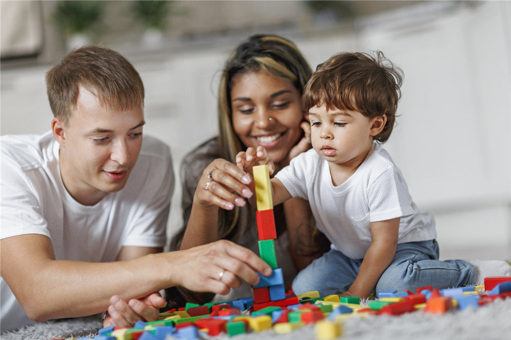 Parents watch the game and the development of their child and rejoice in his achievements