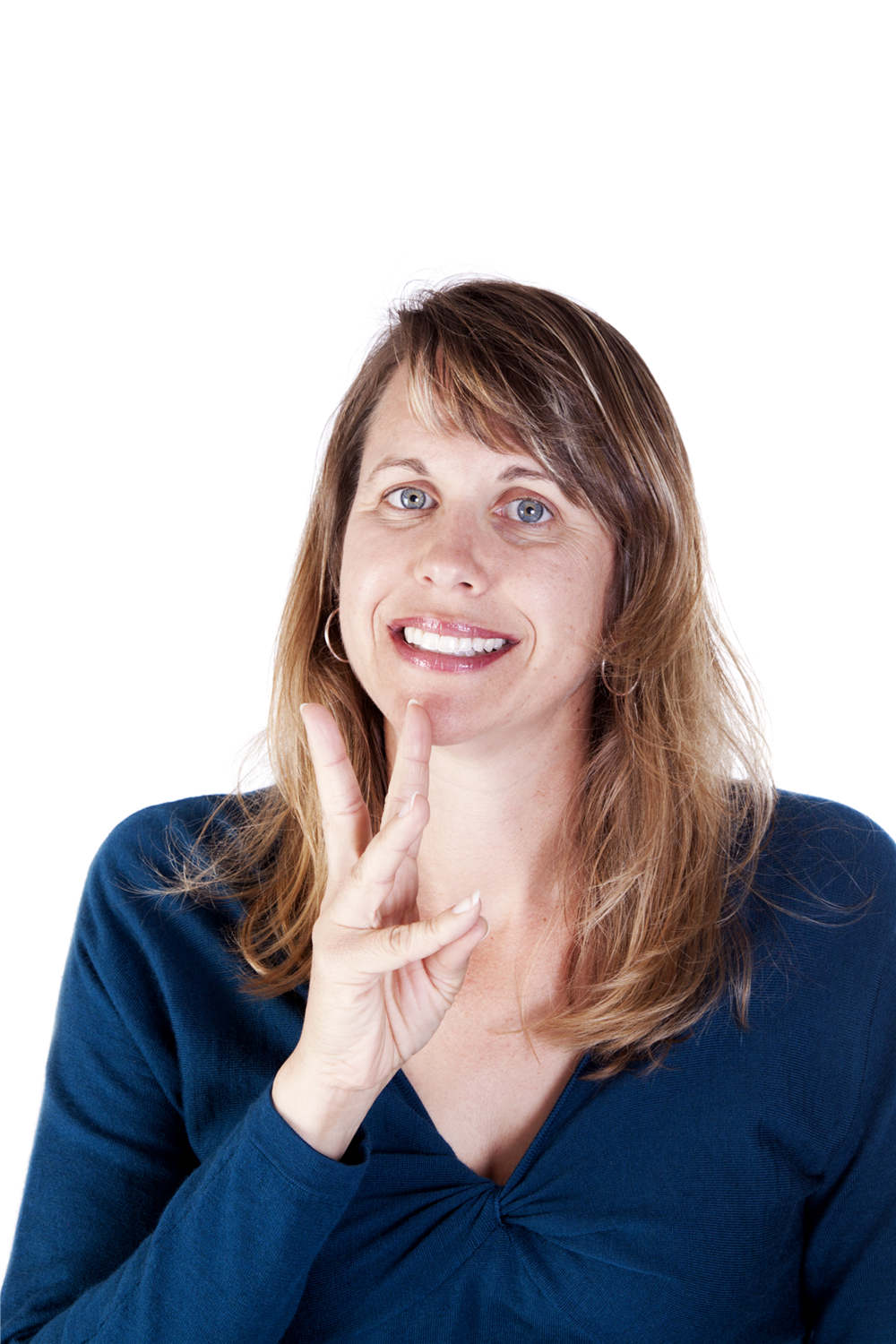 Smiling Caucasian woman making the ASL handshape for WATER.