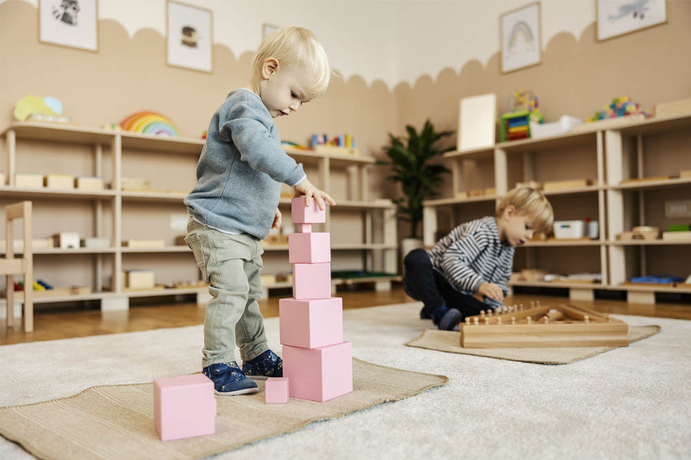 kindergarteners are playing games with wooden toys