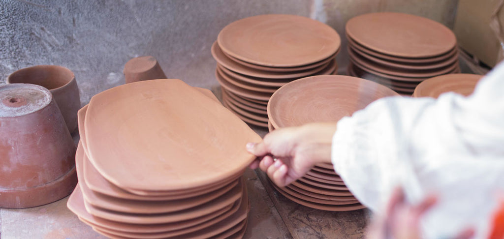A Stack of Bisque Plates