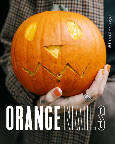 Halloween nail design orange polish