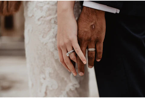 Bride and Groom holding hands