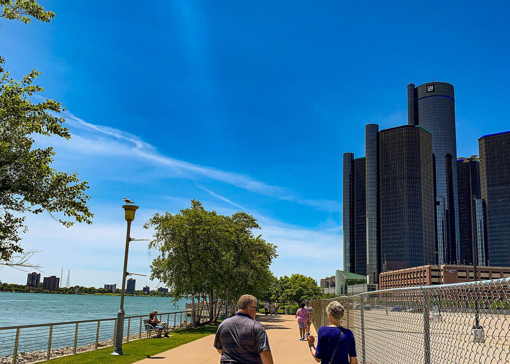 People walking along the coast in Detroit, Michigan.